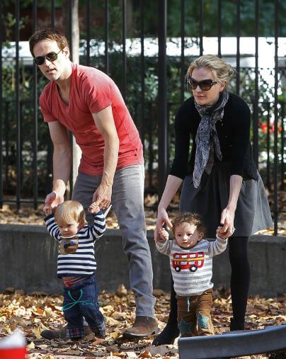 Poppy Moyer with her mother, father and twin brother.